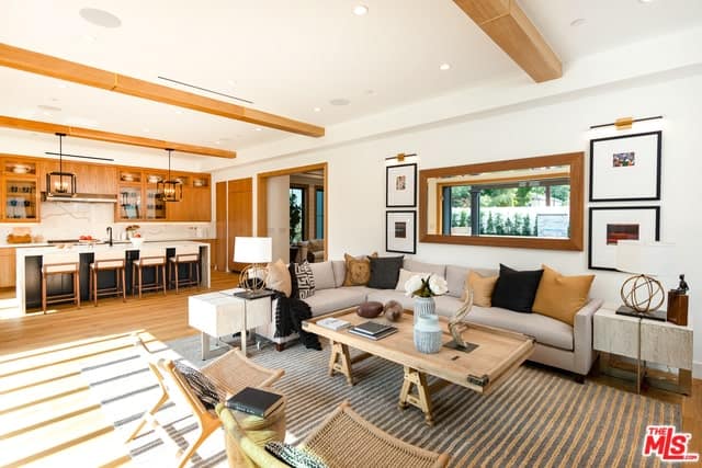 Custom-Built Home with Floor-to-Ceiling Glass Sliding Doors and Shiplap Walls