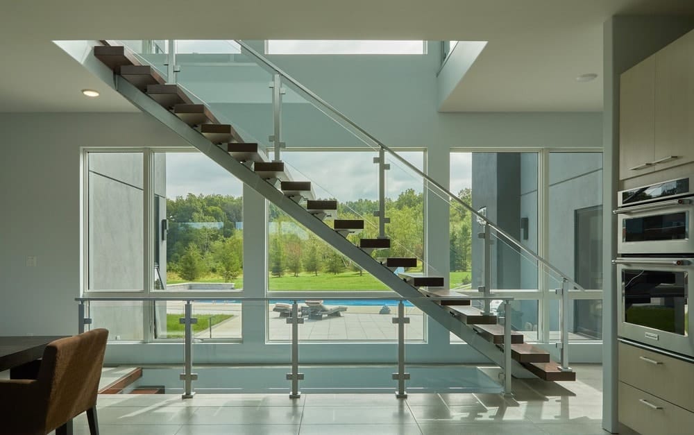 Contemporary Home with Floating Staircase by Viewrail