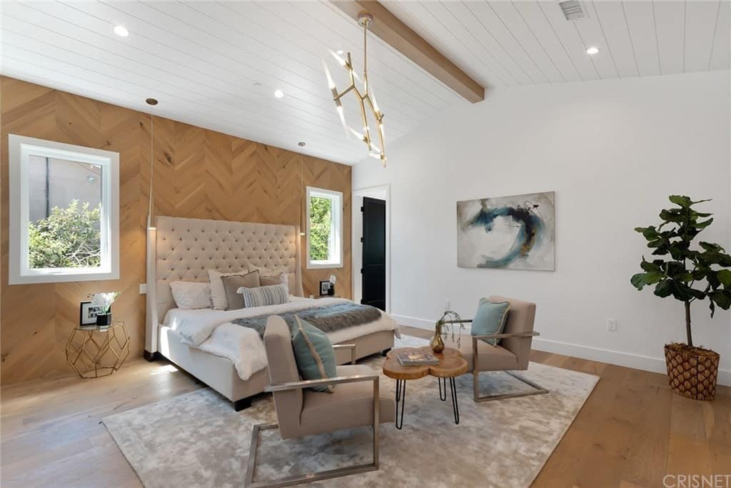 Single-Story Home Featuring Wide Plank Floors and Soaring Ceilings