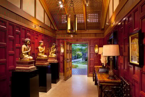 This is an Asian interior design style foyer with redwood paneled walls.