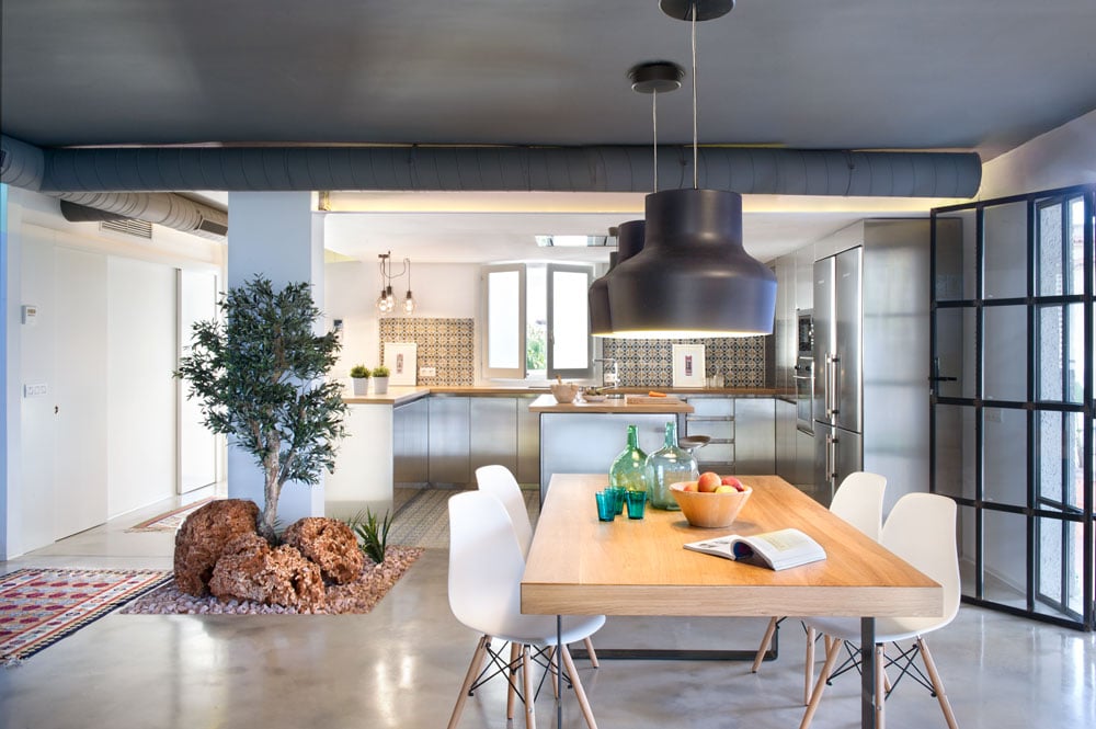Asian-Inspired Designed Home with Stainless Steel Kitchen by egue & seta