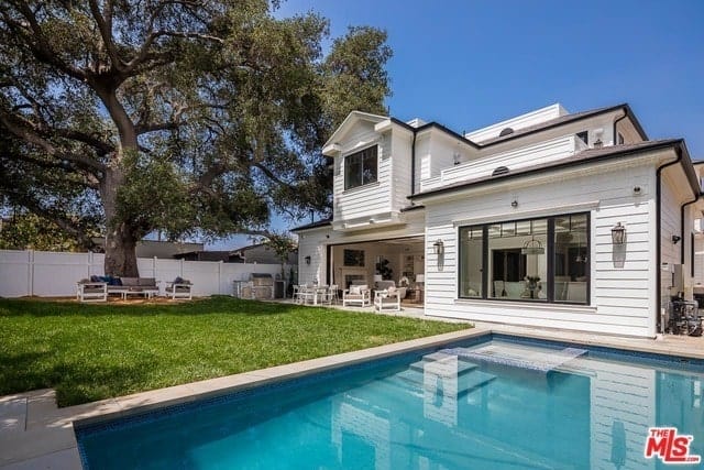 Cape Cod Style Home with High Ceilings and White Oak Floors Throughout