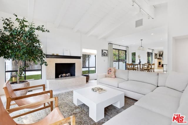 Minimalist Home with Cathedral Beam Ceilings and Large Sliding Doors