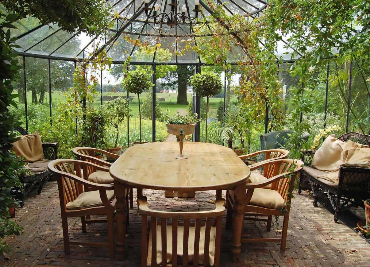 Sunroom veranda with dining table.