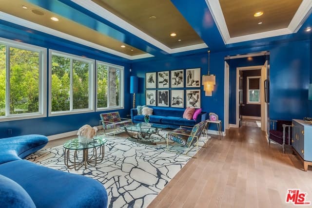 Classic Home with Striking Wallpaper and Rooms with Bold Paint Palette